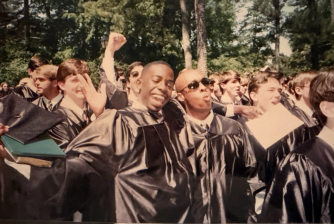Tripoli celebrating graduation with classmates