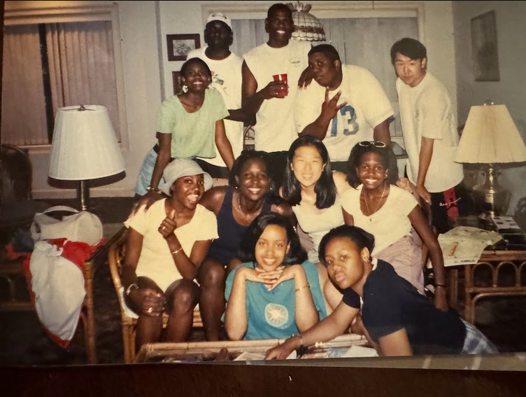 Tripoli and friends gathered in a living room