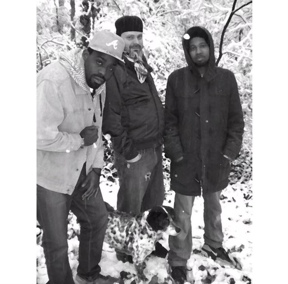 Tripoli with friends and a dog on a snowy day