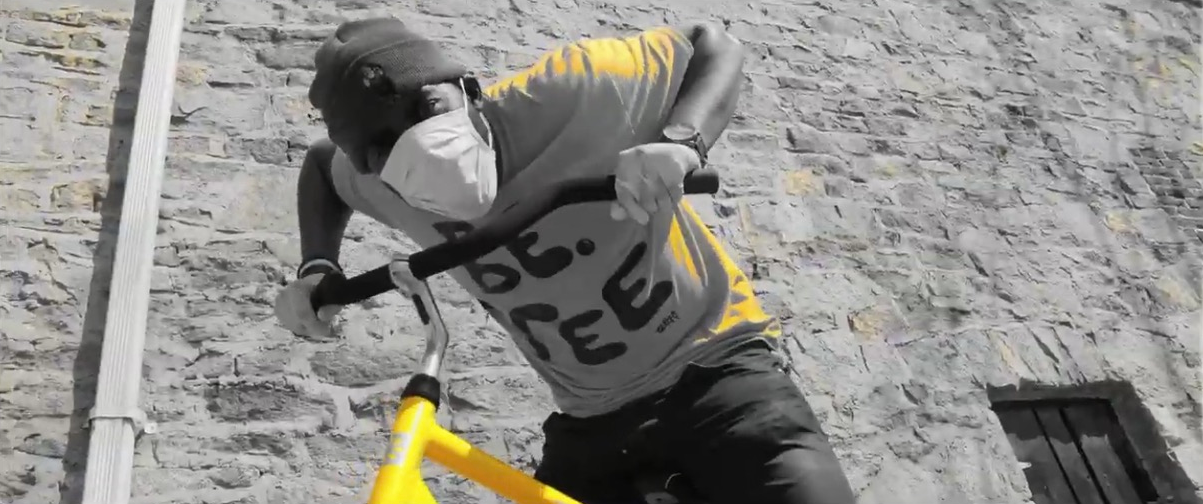Tripoli riding his bicycle, living free