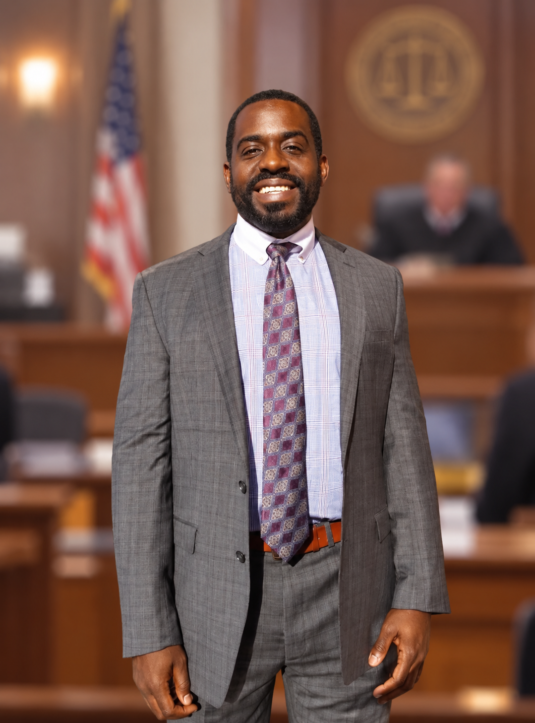 Tripoli as an adult attorney standing in a courtroom