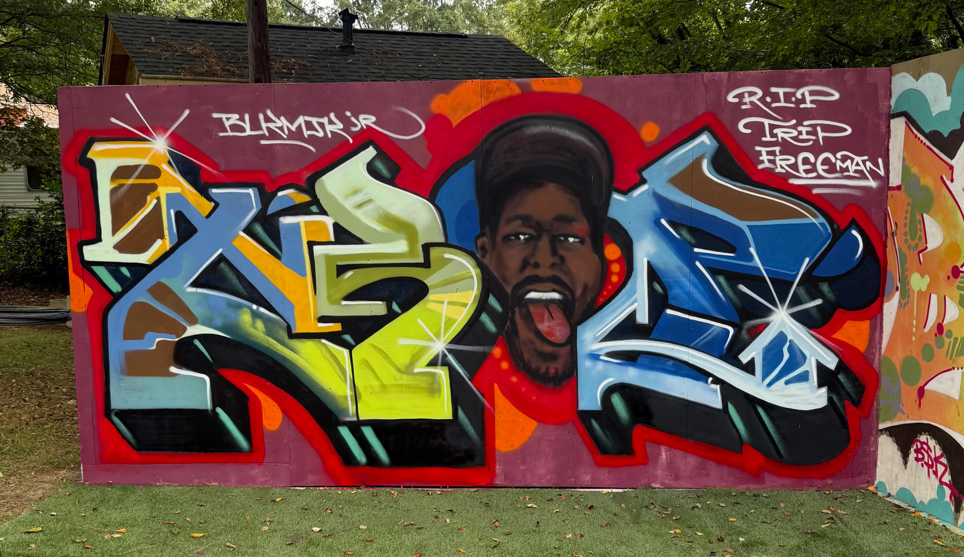 Colorful mural tribute to Tripoli Freeman by friends
