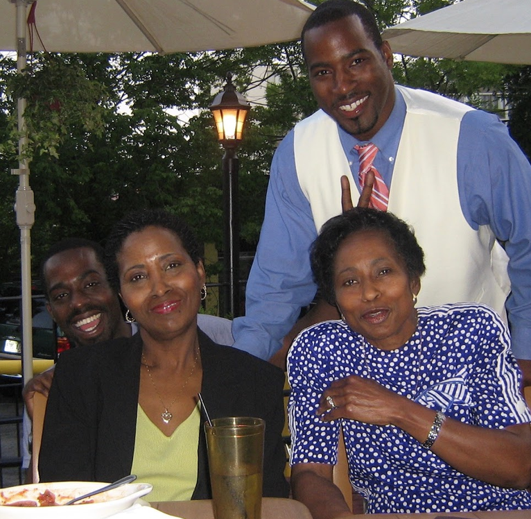 Tripoli with family at an outdoor dinner